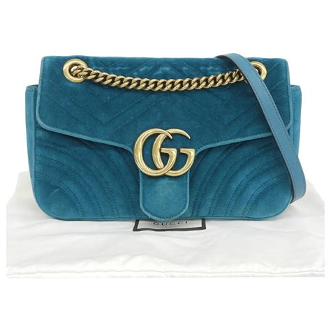 blue suede gucci purse